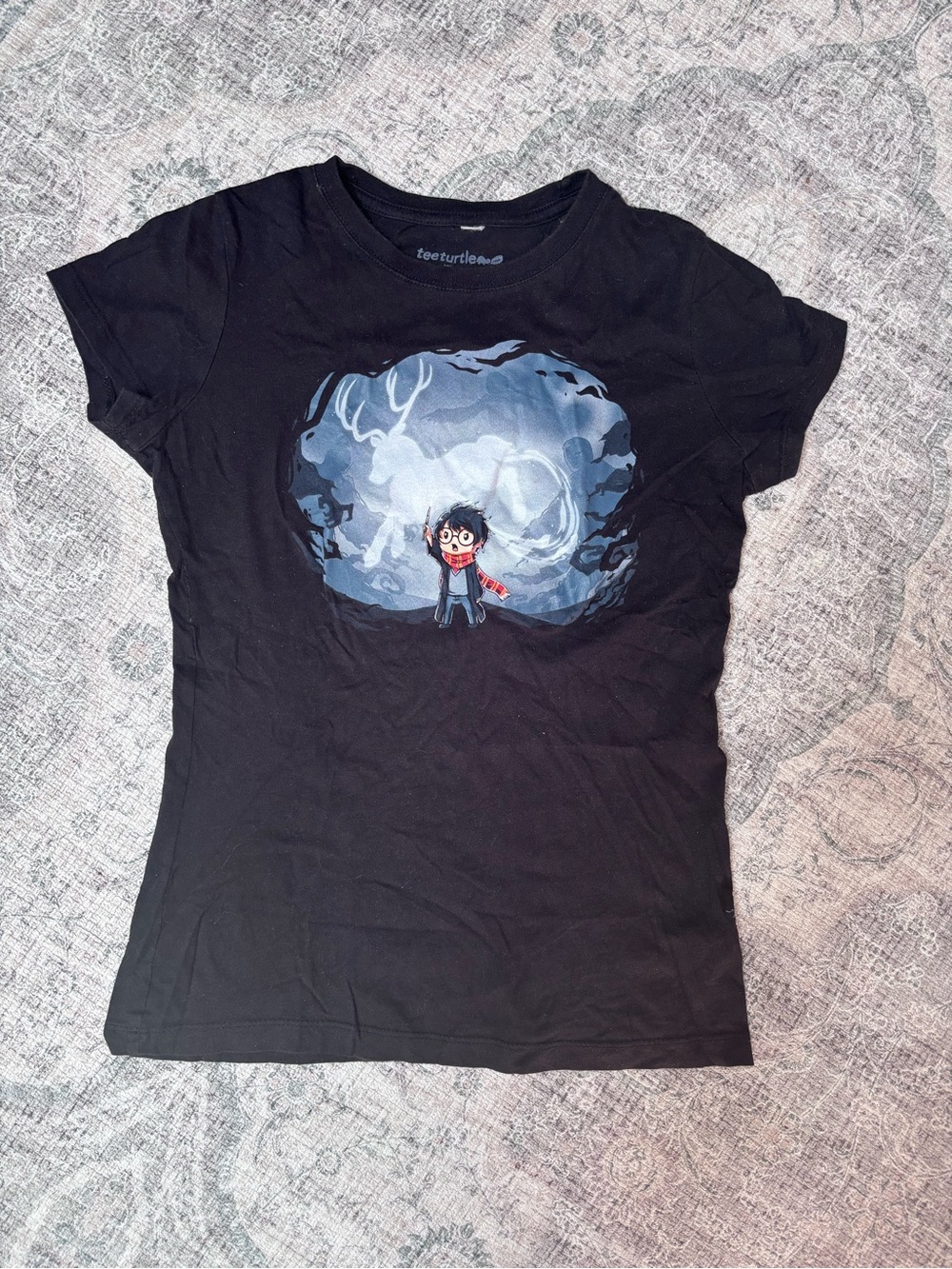 TeeTurtle Harry Potter Glow In The Dark Patronus Graphic T-Shirt, size Small
